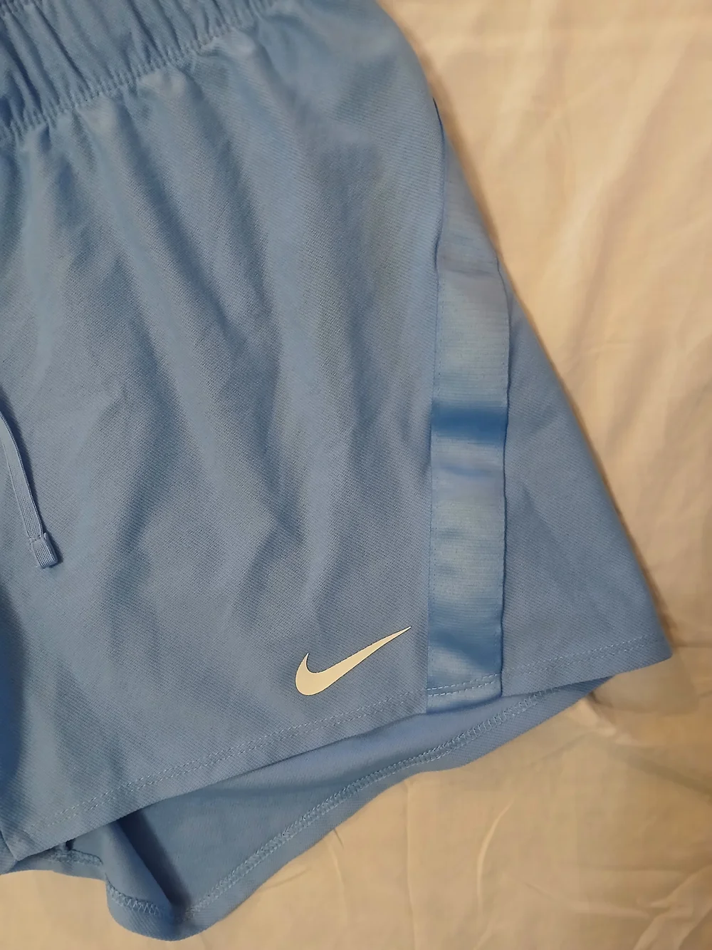 Nike Tempo Luxe Dri Fit Women’s Light Blue Athletic Shorts with White Swoosh